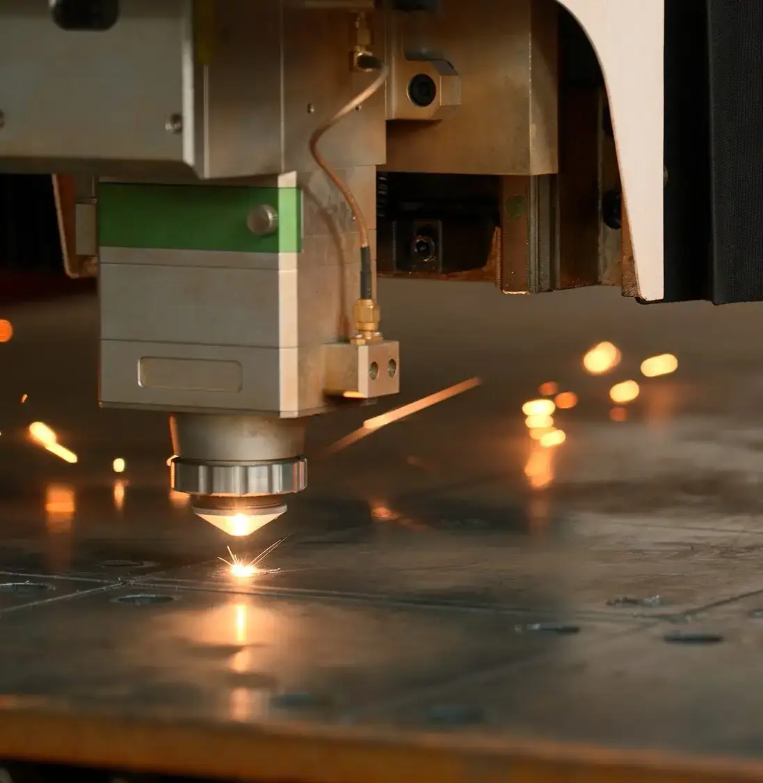 Metalworking Exhibition and a laser cutting machine working with sheet metal. Creative. Industrial